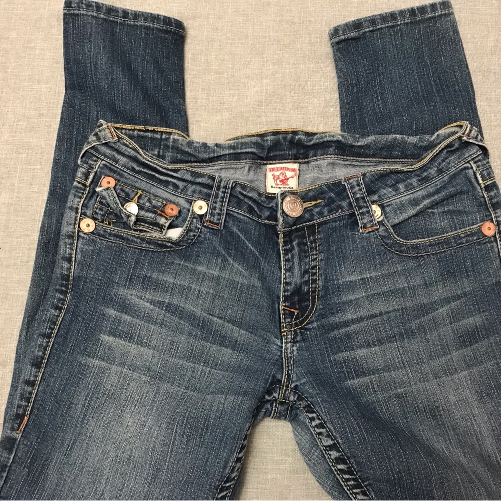 True Religion Blue Skinny Jeans with Vintage-Inspired Wear
